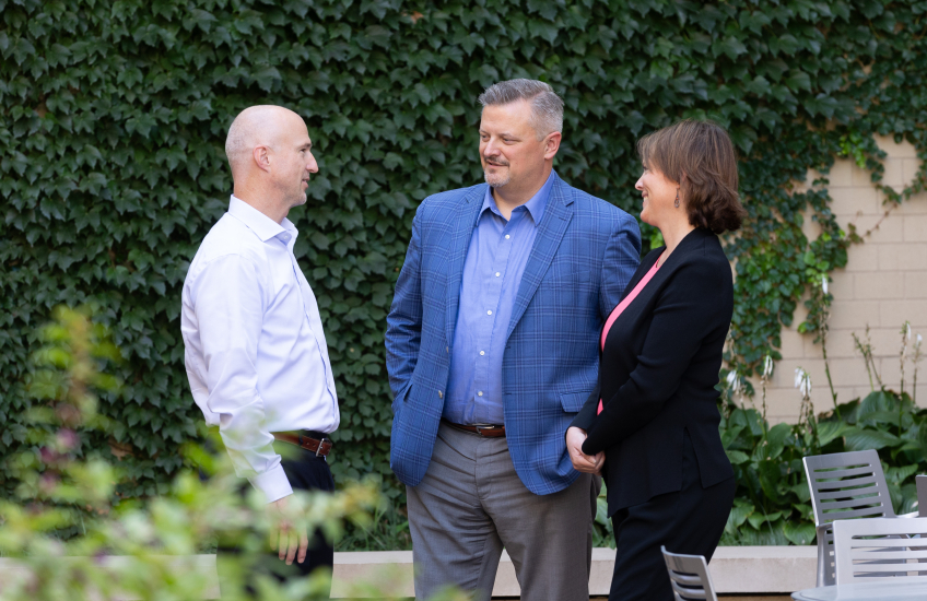 attorneys discussing client success